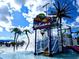Community splash pad with fun water features and slides for a Gathering-friendly environment at 3419 Lakewood Blvd, North Port, FL 34287