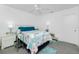 Cozy bedroom with a comfy bed, two side tables and colorful covers and pillows at 379 Peppertree Rd, Venice, FL 34293