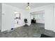 Bright dining room boasts tiled floor, opening to kitchen and living spaces for modern flow at 379 Peppertree Rd, Venice, FL 34293