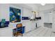 Well-lit kitchen featuring a unique stained glass window, adding artistic charm and character at 379 Peppertree Rd, Venice, FL 34293