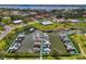 Aerial view of boat docks and a canal in waterfront community at 403 Picasso Dr, Nokomis, FL 34275