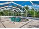 A beautiful, screened-in pool area, perfect for relaxation and outdoor enjoyment at 403 Picasso Dr, Nokomis, FL 34275