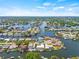 Waterfront home boasts a private pool, lush landscaping, and tranquil water views at 4255 13Th Ne Ln, St Petersburg, FL 33703