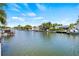 Scenic waterfront view of a canal with boats docked at neighboring homes at 4255 13Th Ne Ln, St Petersburg, FL 33703