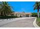 Well maintained one story building with light beige walls, columns and tile roof at 4321 Via Del Santi Dr, Venice, FL 34293