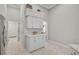 Pantry area with ample white cabinets and counter space at 4321 Via Del Santi Dr, Venice, FL 34293