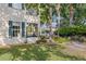 Exterior view of the building overlooking a lake at 442 Sunset Lake Blvd # 104, Venice, FL 34292