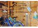 An organized storage area, ideal for bikes and golf clubs, providing ample space for recreational equipment and accessories at 442 Sunset Lake Blvd # 104, Venice, FL 34292