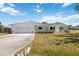 Charming single-story home with a well-maintained lawn and attached two-car garage at 4531 Crystal Rd, Venice, FL 34293