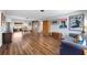 Spacious living room featuring hardwood floors with eclectic decor at 4531 Crystal Rd, Venice, FL 34293