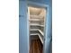 Walk-in pantry with white shelving and ample storage space at 4531 Crystal Rd, Venice, FL 34293