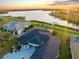 Aerial view of the home showcasing its location on the water with a dock and easy Gulf access at 5035 Collingswood Blvd, Port Charlotte, FL 33948