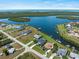 The home is waterfront, with easy Gulf access, and close to area shopping, dining, and attractions at 5035 Collingswood Blvd, Port Charlotte, FL 33948