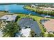 An aerial view of the home showing its desirable location on the water with a private dock at 5035 Collingswood Blvd, Port Charlotte, FL 33948