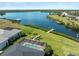 An aerial view shows the home's location on the water, dock and Gulf access at 5035 Collingswood Blvd, Port Charlotte, FL 33948
