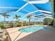 Pool with a built-in spa, and surrounding scenery at 5035 Collingswood Blvd, Port Charlotte, FL 33948