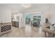 Spacious open floor plan with kitchen island and adjacent dining area perfect for entertaining at 507 Buena Vista Dr, Nokomis, FL 34275
