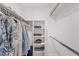 Organized walk-in closet featuring multiple hanging rods and shelving for optimal storage space at 507 Buena Vista Dr, Nokomis, FL 34275