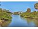 Waterfront home with mature trees, a boat house, and direct access to the canal at 507 Buena Vista Dr, Nokomis, FL 34275