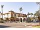 Exterior view of Daiquiri Deck restaurant with outdoor seating, terracotta tile roof and palm trees at 510 Airport E Ave # 2C, Venice, FL 34285