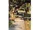 Exterior shot of a sidewalk with mature shade trees at 510 Airport E Ave # 2C, Venice, FL 34285