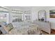 Inviting bedroom filled with natural light and pleasant outdoor views at 5189 Pine Shadow Ln, North Port, FL 34287