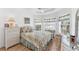 Cozy bedroom with natural light and charming decor at 5189 Pine Shadow Ln, North Port, FL 34287