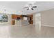 Spacious living area offers an open layout, a breakfast bar and ample natural light at 5255 Layton Dr, Venice, FL 34293