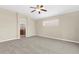Carpeted main bedroom with en-suite bathroom and ample natural light at 5255 Layton Dr, Venice, FL 34293