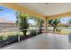 A screened patio shows the yard and surrounding houses at 5255 Layton Dr, Venice, FL 34293