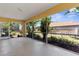 A screened patio shows the lawn and surrounding houses in the community at 5255 Layton Dr, Venice, FL 34293