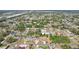 Expansive aerial view showcases the neighborhood's lush landscaping and serene surroundings at 5417 Maccaughey Dr, North Port, FL 34287