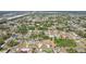 Expansive aerial view showcases the neighborhood's lush landscaping and serene surroundings at 5417 Maccaughey Dr, North Port, FL 34287