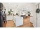 Bright, open kitchen with stainless steel appliances, a large island and seamless access to the living area at 5417 Maccaughey Dr, North Port, FL 34287