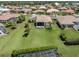 Aerial view of a home with a large, well-maintained backyard at 615 May Apple Way, Venice, FL 34293