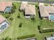 Aerial view of a spacious backyard and lawn at 615 May Apple Way, Venice, FL 34293
