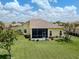 Aerial view of the back of this lovely home featuring a screened lanai at 615 May Apple Way, Venice, FL 34293