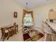 Breakfast nook with table, seating and view to the outside at 615 May Apple Way, Venice, FL 34293