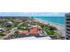 Gorgeous aerial view showing the neighborhood, beach, ocean and home with a pool, and more at 627 Alhambra Rd # 1103, Venice, FL 34285