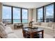 Inviting living room filled with natural light and showcasing panoramic ocean views at 627 Alhambra Rd # 1103, Venice, FL 34285