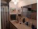 Bathroom features a vanity and art, enhancing the space's style at 638 Leisure, Venice, FL 34285