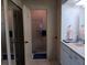 Bathroom features an extended vanity area and a glass-door shower at 638 Leisure, Venice, FL 34285