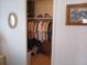 Bedroom closet features ample storage with clothes, luggage, and decor at 638 Leisure, Venice, FL 34285
