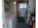 Efficient storage space with washer/dryer, shelving, and room for organizing household items at 638 Leisure, Venice, FL 34285