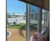 Scenic view from the window showcases the neighborhood's charming homes and well-kept landscaping at 638 Leisure, Venice, FL 34285