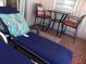 Relax on this patio with lounge chairs and outdoor seating at 722 Carefree, Venice, FL 34285