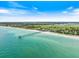 A beautiful aerial shot of the Venice Fishing Pier with views of the Gulf, beach, and nearby community at 758 Bird Bay W Dr # 169, Venice, FL 34285