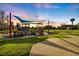 Community playground in a park setting with picnic pavilion at 758 Bird Bay W Dr # 169, Venice, FL 34285