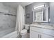 Bathroom with shower/tub combo, white vanity, and grey walls at 764 Avenida Estancia # 212, Venice, FL 34292