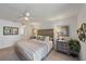 Bedroom featuring neutral tones, comfortable bed, and stylish decor at 764 Avenida Estancia # 212, Venice, FL 34292